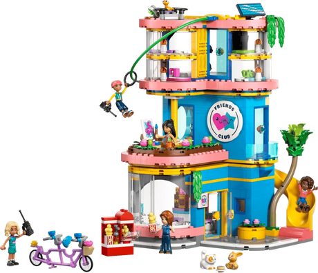 LEGO Friends Heartlake City Friends Club House 42689 showing the colourful three storey clubhouse with zip line, slide, minidolls, tandem bicycle, pets and rooftop drone.