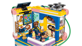 Upper floor of LEGO Friends Heartlake City Friends Club House 42689 showing minidolls relaxing and playing video games, with sofas, gaming controllers, snacks, pets and rooftop drone.