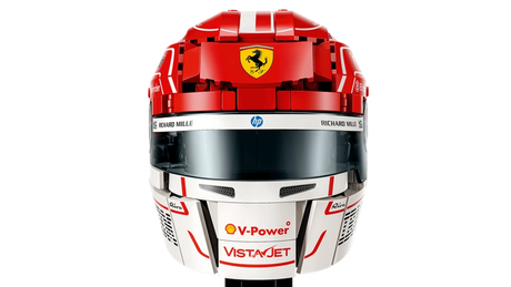 Front close-up of LEGO Scuderia Ferrari HP Charles Leclerc Helmet 43014 showing the red Ferrari helmet, Prancing Horse badge, dark visor, white chin section and V-Power branding.