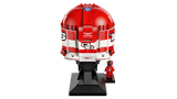 Rear view of LEGO Charles Leclerc Ferrari Helmet 43014 showing the red helmet design, white stripes, HP logo, CL16 markings and Charles Leclerc minifigure.