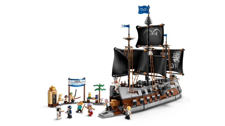 LEGO ONE PIECE Garp's Marine Battleship 75646 showing the complete warship with black sails, open boarding ramp, Marine Victory Day market scene and minifigures arranged around the ship.