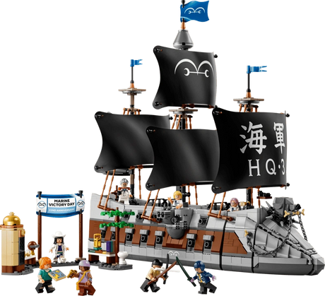 LEGO ONE PIECE Garp's Marine Battleship 75646 showing the grey and brown warship with black Marine sails, blue flags, dog figurehead, eight minifigures and Marine Victory Day market scene.