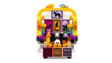 Front view of the LEGO Altar of the Dead 40811 altar side with flowers, framed pictures and food details