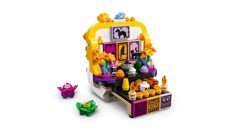 Angled view of the LEGO Altar of the Dead 40811 altar side with two small colourful builds beside it