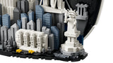 Close view of the LEGO Statue of Liberty and Metropolitan Museum of Art with blue and grey city buildings behind them