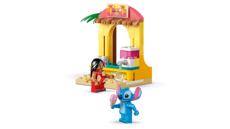 LEGO Lilo and Stitch figures beside a yellow shave ice shop with a pink and white counter