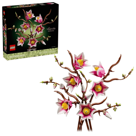 LEGO Botanicals Magnolia Branches 11510 retail box beside assembled display with pink and white magnolia blossoms on brown branches