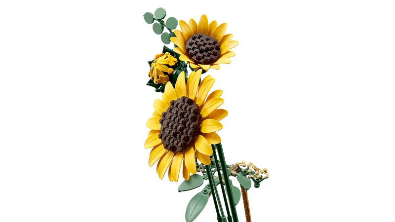 Side view of LEGO Botanicals Sunflower Bouquet 11502 showing two large open sunflowers, one smaller bloom and green stems
