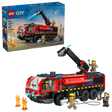 LEGO City Airport Fire Truck 60499 retail box beside assembled red airport fire truck with four firefighter minifigures and flame elements