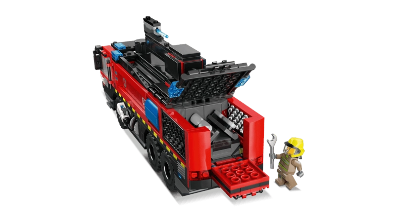 LEGO City Airport Fire Truck 60499 rear three quarter view with rear compartment open showing internal storage details and firefighter minifigure holding a wrench