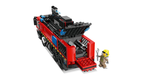 LEGO City Airport Fire Truck 60499 rear three quarter view with rear compartment open showing internal storage details and firefighter minifigure holding a wrench