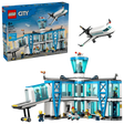 LEGO City Airport with Airplane box beside the completed airport terminal and passenger airplane model