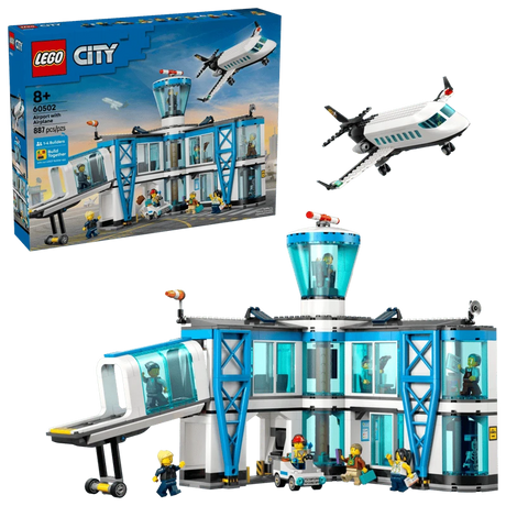 LEGO City Airport with Airplane box beside the completed airport terminal and passenger airplane model