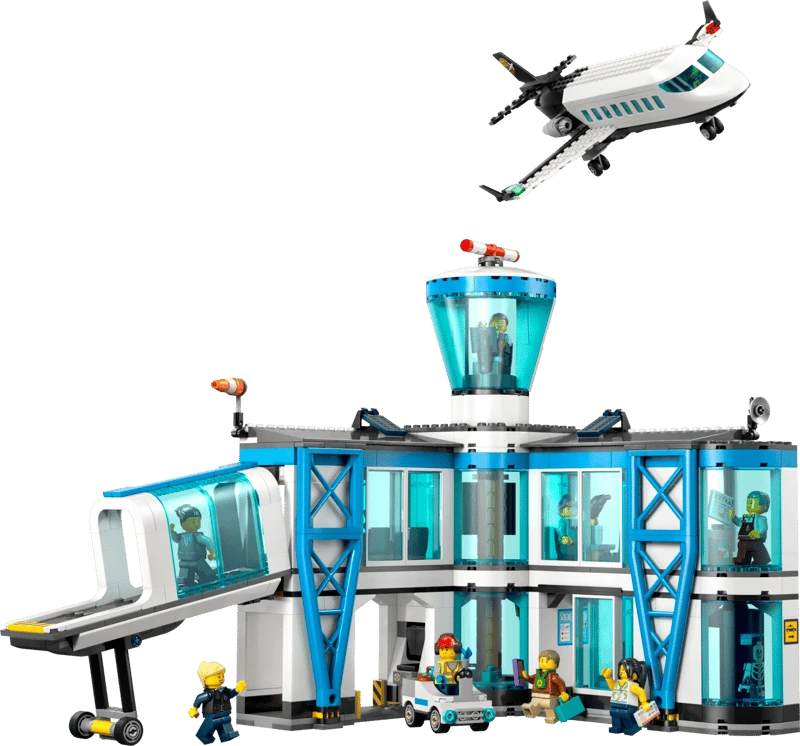 LEGO City airport terminal model with passenger airplane flying above and minifigures around the building