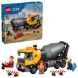 LEGO City cement mixer truck shown beside the retail box, with three construction minifigures, wheelbarrow, road barriers and road sign

