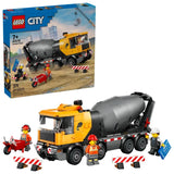 LEGO City cement mixer truck shown beside the retail box, with three construction minifigures, wheelbarrow, road barriers and road sign
