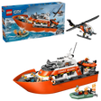 LEGO City Coast Guard Rescue Boat & Helicopter 60504 retail box beside assembled orange and white patrol boat with helicopter, dinghies, flame elements and minifigures