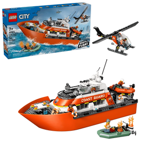 LEGO City Coast Guard Rescue Boat & Helicopter 60504 retail box beside assembled orange and white patrol boat with helicopter, dinghies, flame elements and minifigures