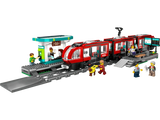 LEGO City red streetcar with station platform, coffee shop, minifigures, wheelchair and guide dog figure