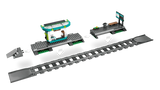 LEGO City station platform sections, track pieces and ramps shown separated with white direction arrows