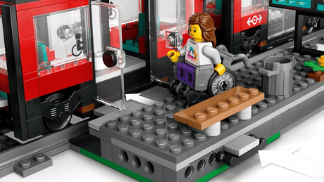 LEGO City wheelchair minifigure beside the open streetcar door on the station platform