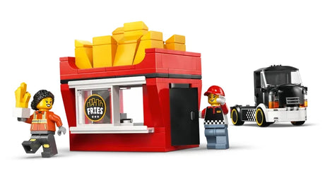LEGO City fries food truck kiosk module with fries shaped roof shown beside two LEGO City minifigures and the detached truck cab
