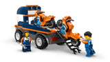 Rear view of LEGO City Motorcycle Transporter showing loading ramp lowered with two orange motorcycles and two minifigures
