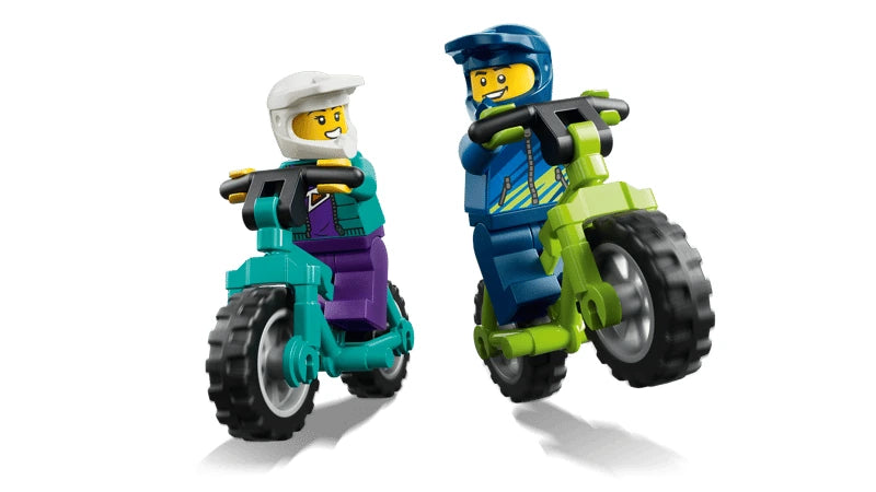 Two LEGO rider minifigures on mountain bikes