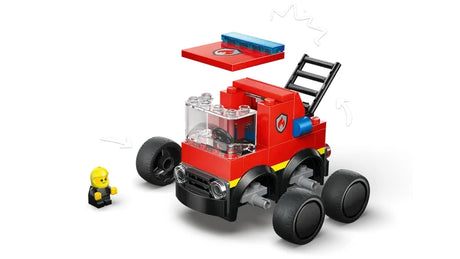 LEGO City Rides red fire truck model shown with a separate red roof piece and a black ladder element positioned above and behind the vehicle, with a small yellow minifigure nearby