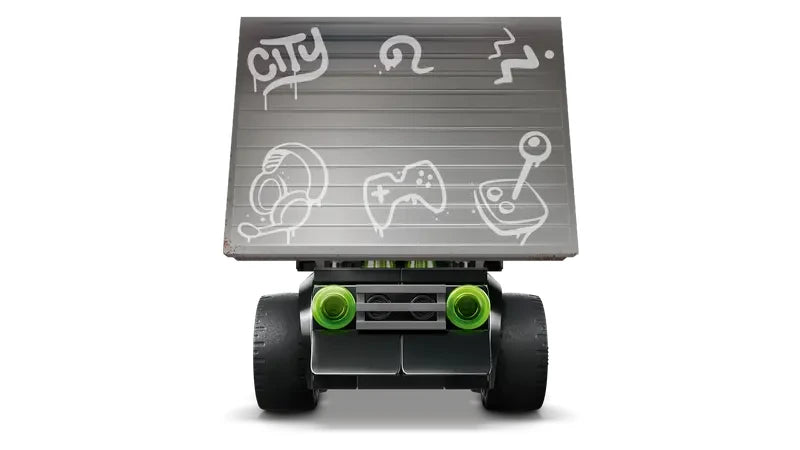 Front view of the LEGO City Rides black and green vehicle with a grey rectangular panel raised above the front, showing light grey graffiti line drawings and the word CITY