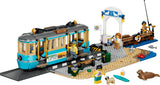 LEGO City beach streetcar set with station, pier, ice cream stand, minifigures, surfboard and seal figure