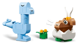 LEGO Classic Creative Dinosaurs blue long-neck dinosaur beside a brown baby dinosaur hatching from a white egg and yellow flowers