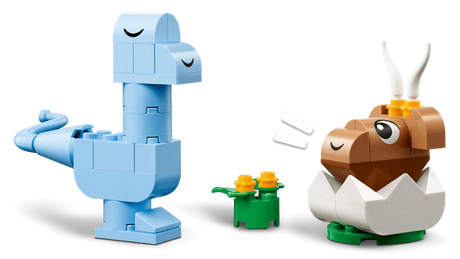 LEGO Classic Creative Dinosaurs blue long-neck dinosaur beside a brown baby dinosaur hatching from a white egg and yellow flowers