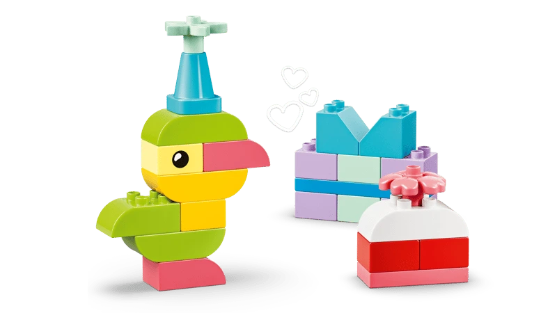 LEGO DUPLO bird build beside small block builds including a cake