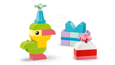LEGO DUPLO bird build beside small block builds including a cake