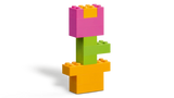 LEGO flower build with pink petals, green stem and orange pot