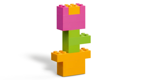 LEGO flower build with pink petals, green stem and orange pot