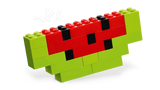 LEGO brick watermelon build with green, red and black pieces