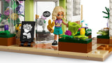 LEGO Friends flower shop interior with Nova mini-doll, watering can, flowers and shop sign