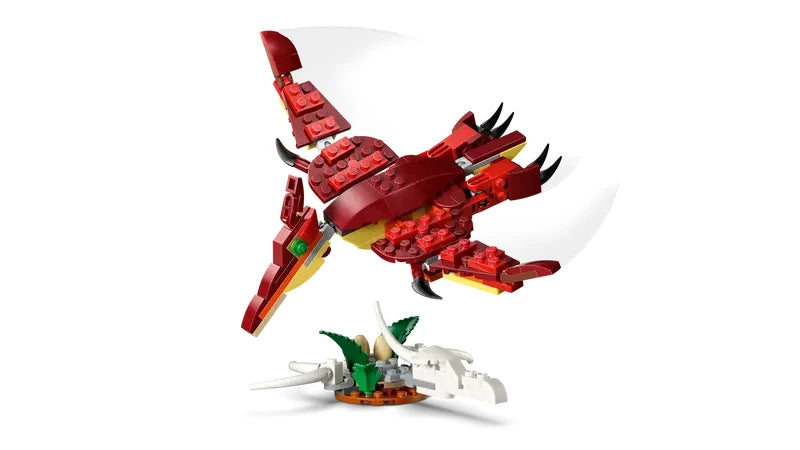 LEGO Creator 3 in 1 Fierce Dinosaur Pterosaur model shown on white background above dinosaur skull and eggs