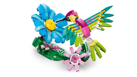 LEGO Creator 3 in 1 Wild Animals Colorful Hummingbird hummingbird model shown flying above flowers on white background