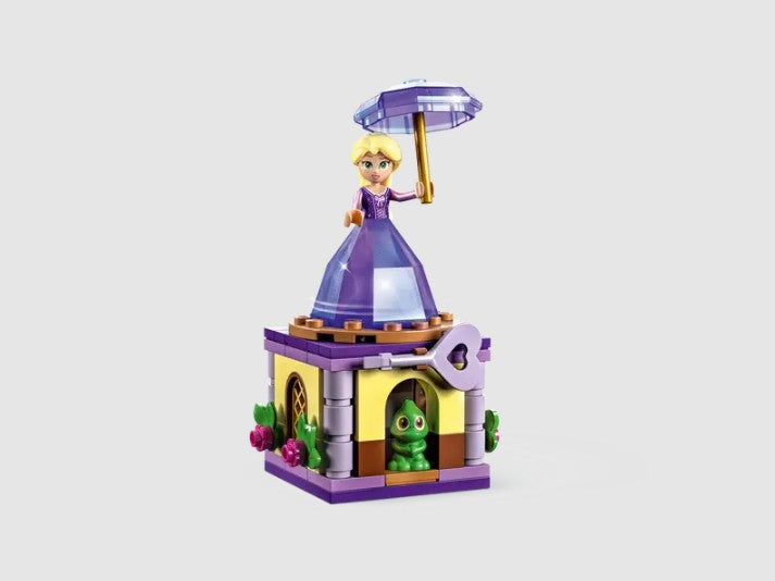 LEGO Disney Rapunzel figure spinning on diamond display stand