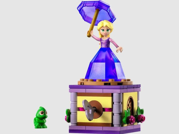 LEGO Disney Twirling Rapunzel spinning on a display stand with Pascal the chameleon