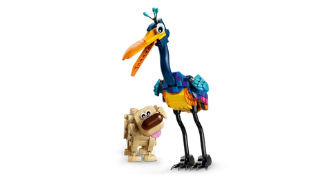LEGO Disney Kevin and Dug standing together, showing Kevin's long blue neck, open orange beak and colourful wings beside Dug with his brown nose and pink tongue.