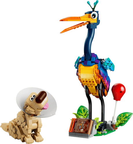 LEGO Disney Kevin and Dug from Pixar's Up, showing colourful Kevin with an open orange beak, Dug wearing a white cone, and a display featuring a red balloon, green plants and My Adventure Book.