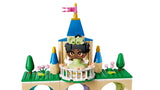 Close up view of the top tower of the LEGO Disney Princess castle with balcony, flags and Mini Tiana figure visible