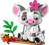 Completed LEGO Disney Pua 43292 model featuring the white and grey pig with large pink ears and a flower on its head, seated on a brown raft beside an orange hermit crab and green plants.
