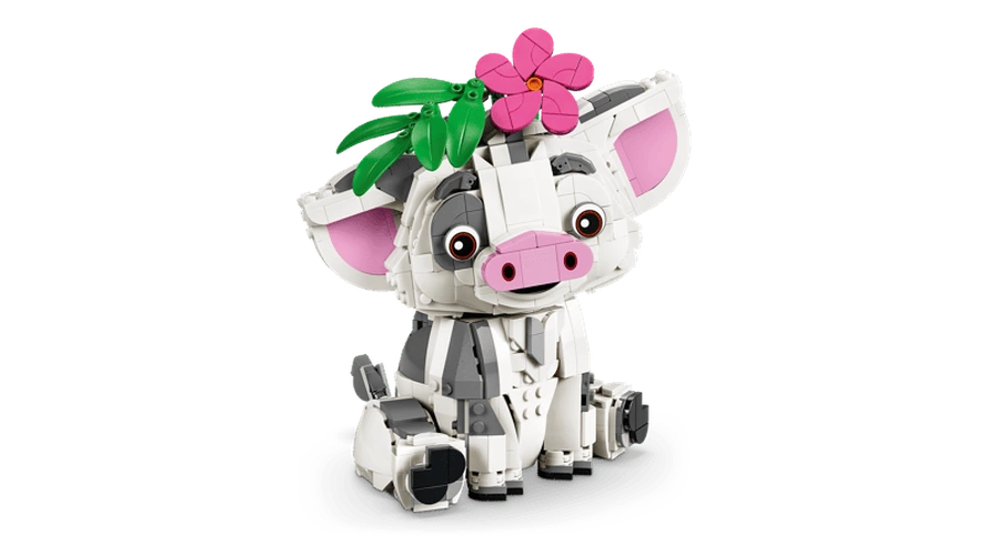 LEGO Disney Pua pig sitting with a pink flower and green leaves attached to its head, showing its large pink ears, round eyes, pink snout and white and grey body.