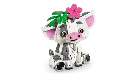 LEGO Disney Pua pig sitting with a pink flower and green leaves attached to its head, showing its large pink ears, round eyes, pink snout and white and grey body.