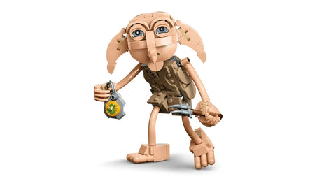 LEGO Dobby figure posed with a fork, green locket and sword accessory